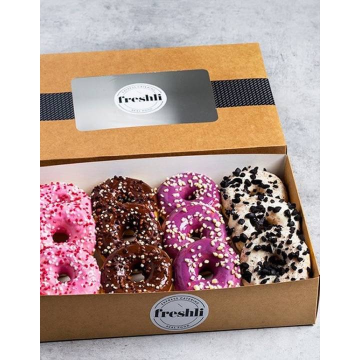 Box de 12 unidades de surtido Fancy MixDots glaseados de cuatro sabores.
