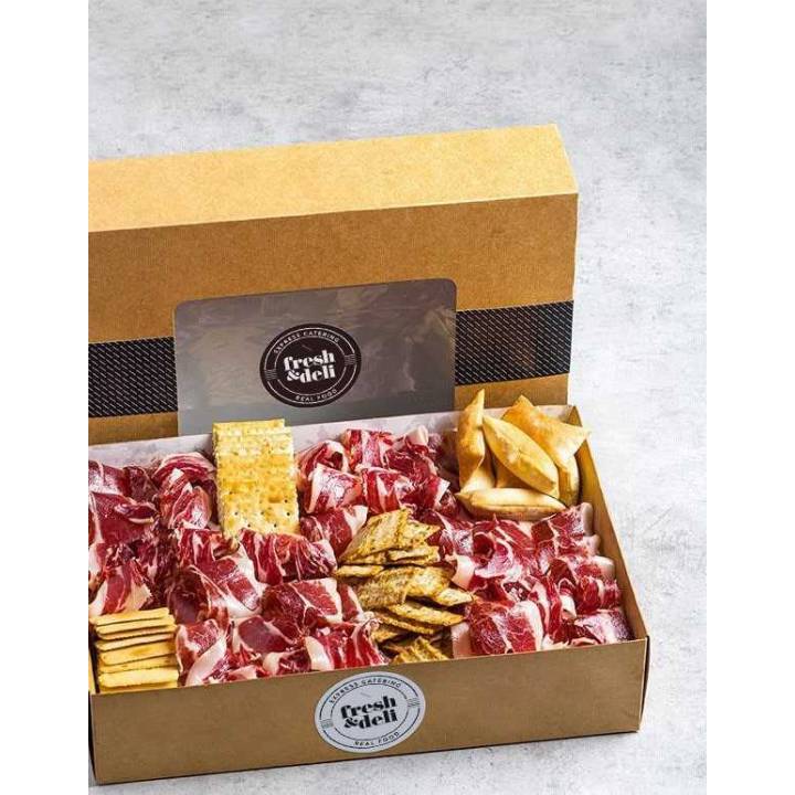 Bandeja de 500 g. de jamón ibérico de bellota acompañado de galleta Tuc original y picos de pan.