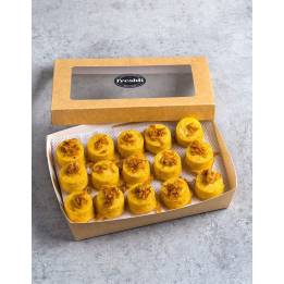 Box de 15 unidades de mini pastelitos de tortilla de patatas y cristal de cebolla.